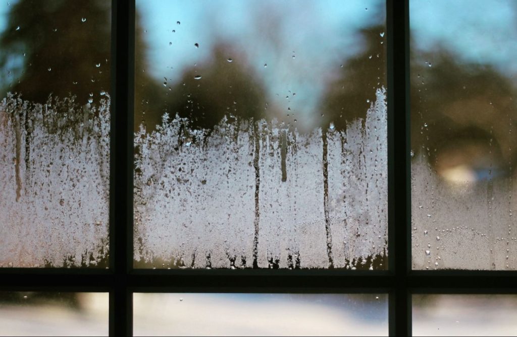 Condensation between window panes showing failed glass seal