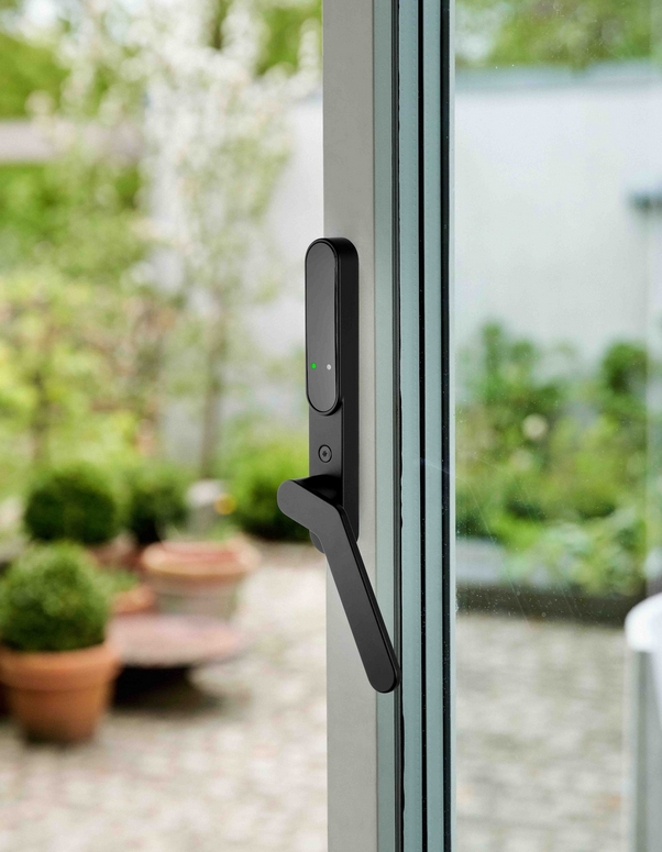 Modern smart patio door handle with integrated security sensor